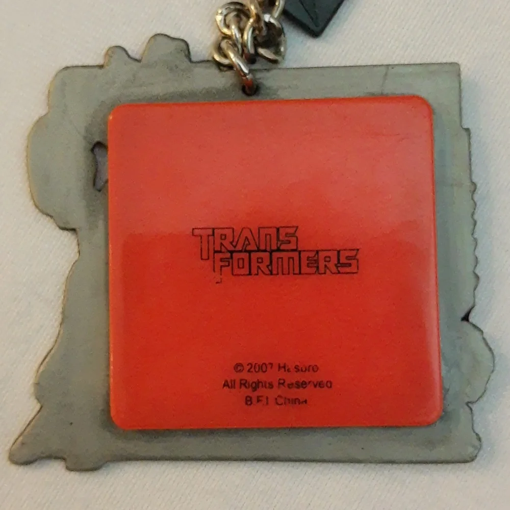 Transformers Miniature Slide Puzzle Keychain Autobot Symbol 2007
